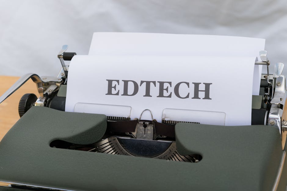 A vintage typewriter with a paper labeled 'EDTECH', signifying educational technology